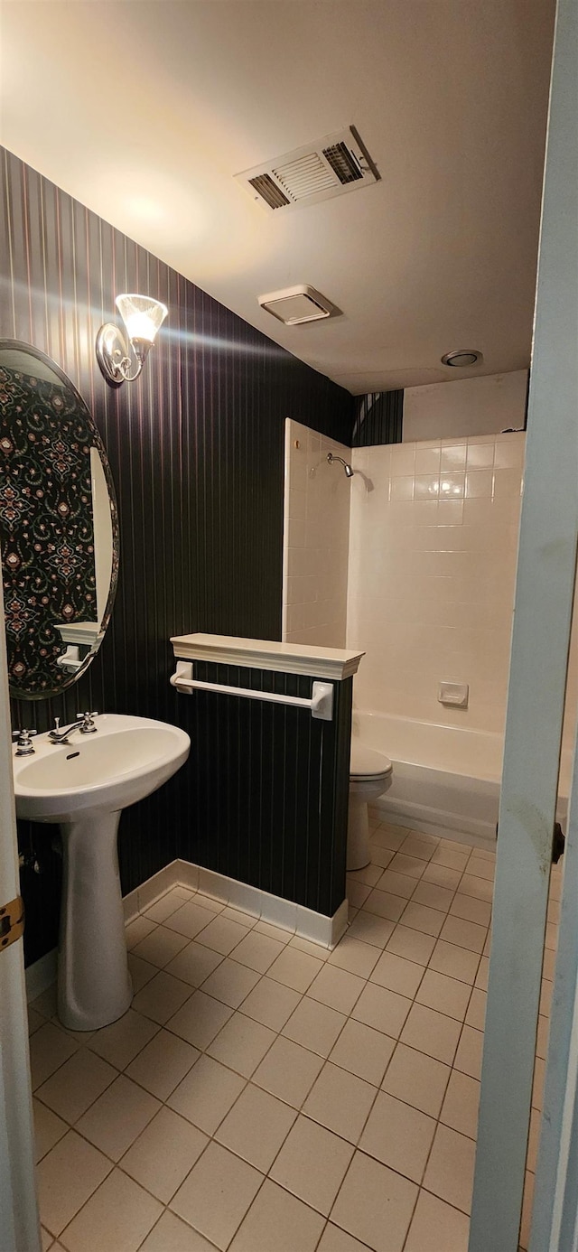 full bathroom featuring shower / tub combination, tile patterned flooring, toilet, wallpapered walls, and visible vents