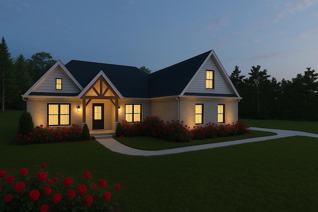 craftsman-style house with a front lawn and stone siding