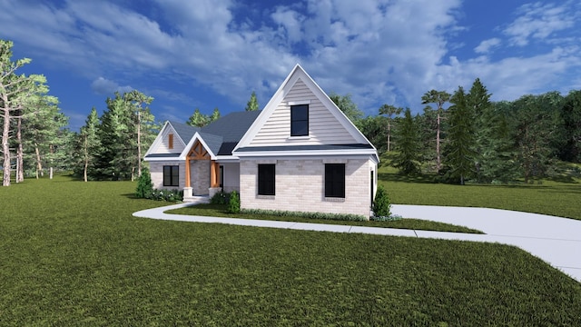 view of front facade featuring brick siding and a front lawn