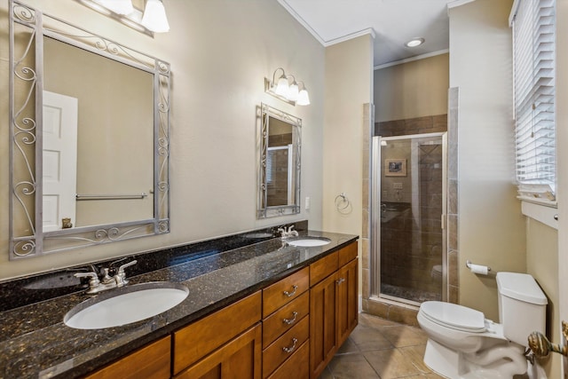 full bathroom with toilet, a shower stall, a sink, and tile patterned flooring