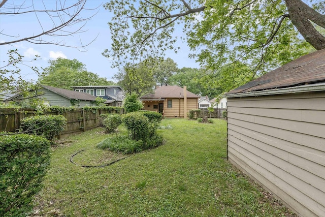 view of yard featuring fence