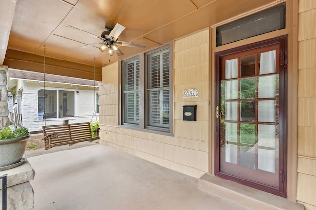 view of patio featuring a porch and a ceiling fan
