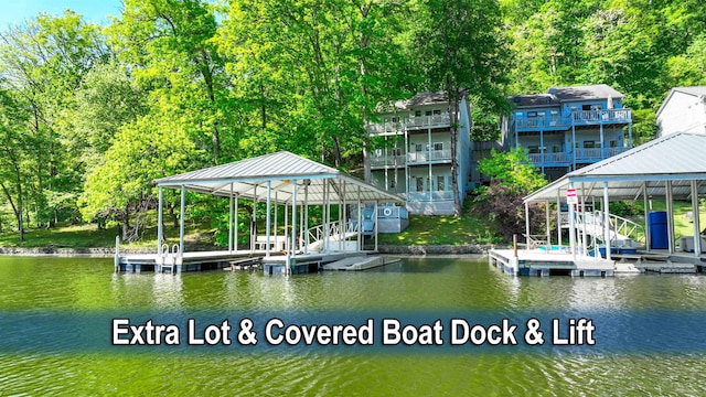 50 Red Oak Pt, Savannah, TN 38372 - view of dock featuring boat lift and a water view