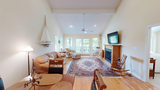 50 Red Oak Pt, Savannah, TN 38372 - living room featuring high vaulted ceiling, wood finished floors, a fireplace, and ceiling fan