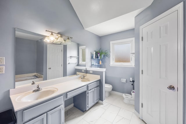 6747 Wild Ln, Bartlett, TN 38135 - full bathroom featuring a sink, toilet, double vanity, and marble finish floor
