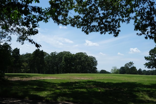 view of landscape featuring a wooded view