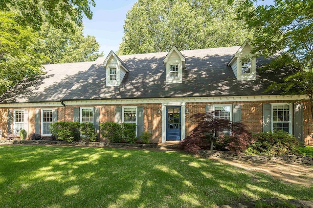 3365 Stone Creek Cv, Collierville, TN 38017 - new england style home with a front lawn and brick siding