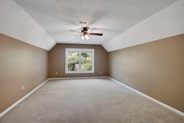 3365 Stone Creek Cv, Collierville, TN 38017 - bonus room with visible vents, carpet flooring, ceiling fan, and lofted ceiling