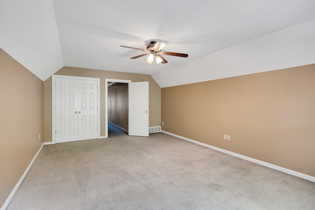 3365 Stone Creek Cv, Collierville, TN 38017 - additional living space with ceiling fan, visible vents, carpet floors, baseboards, and lofted ceiling