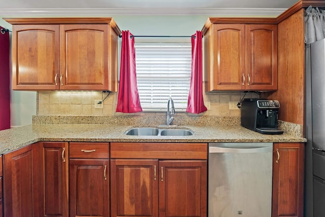 kitchen featuring stainless steel dishwasher, decorative backsplash, brown cabinetry, light stone counters, and a sink