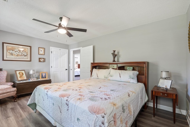 90 Shaker Dr, Senatobia, MS 38668 - bedroom with baseboards, ceiling fan, and wood finished floors