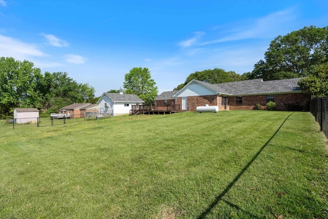90 Shaker Dr, Senatobia, MS 38668 - view of yard with a fenced backyard and a wooden deck