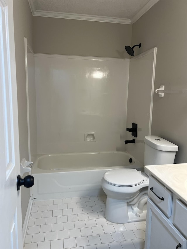 bathroom with washtub / shower combination, vanity, toilet, tile patterned floors, and ornamental molding