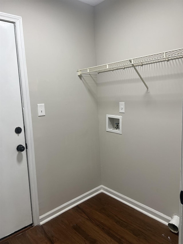 laundry area with washer hookup, hookup for an electric dryer, laundry area, baseboards, and dark wood-style floors