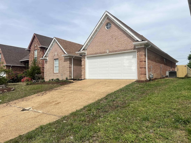 view of front facade with brick siding, an attached garage, and concrete driveway