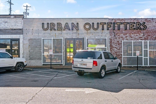 view of property with uncovered parking