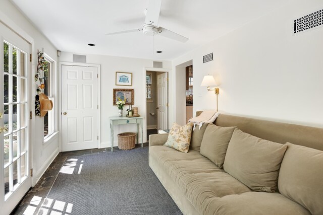 246 Palisade St, Memphis, TN 38111 - living area with baseboards, ceiling fan, and visible vents