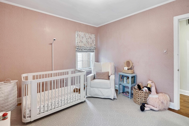 246 Palisade St, Memphis, TN 38111 - bedroom featuring crown molding, a nursery area, and baseboards