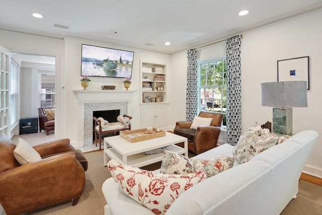 246 Palisade St, Memphis, TN 38111 - living area featuring crown molding, a fireplace, recessed lighting, and visible vents
