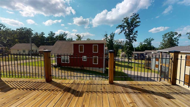 wooden terrace with a yard and fence private yard
