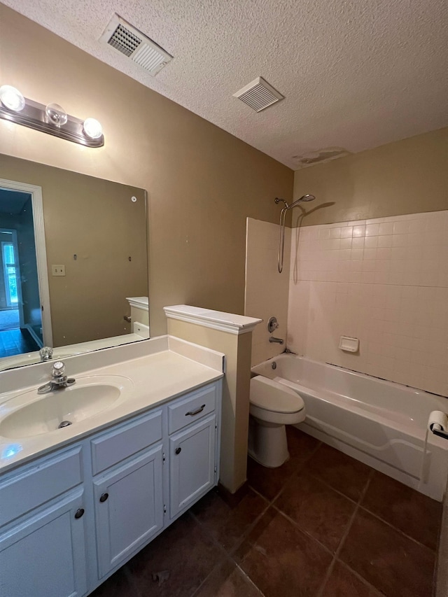 bathroom with visible vents, tile patterned floors, vanity, toilet, and tub / shower combination