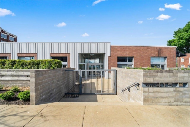 415 S Front St Unit 110, Memphis, TN 38103 - view of front of house featuring fence private yard and a gate