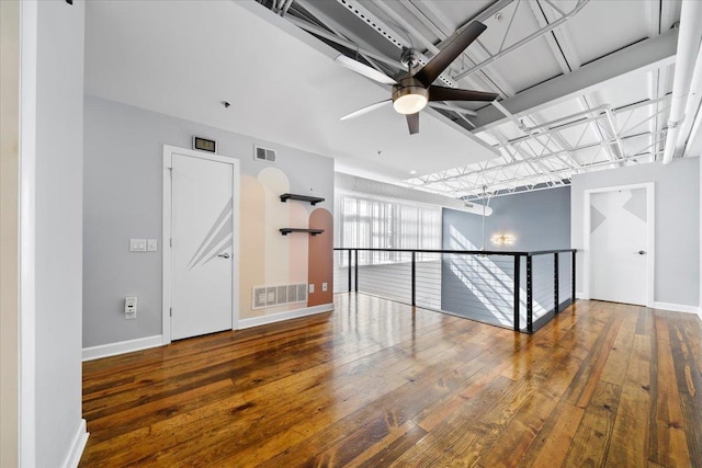 415 S Front St Unit 110, Memphis, TN 38103 - spare room with visible vents, a ceiling fan, wood-type flooring, and baseboards