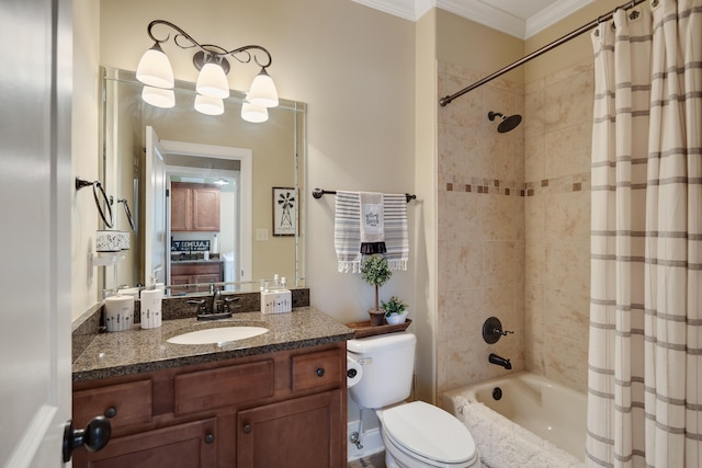bathroom with vanity, ornamental molding, toilet, and shower / tub combo