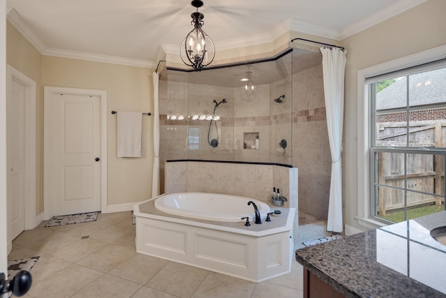 bathroom featuring tile patterned floors, a bath, a chandelier, and a tile shower