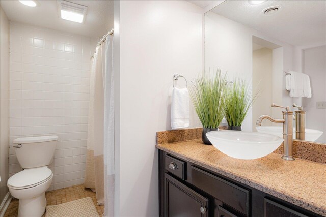 1186 Chamberlain Dr Unit 4, Memphis, TN 38119 - full bathroom with vanity, tile patterned floors, and toilet