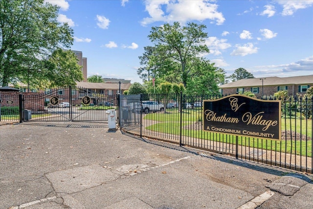view of gate featuring fence