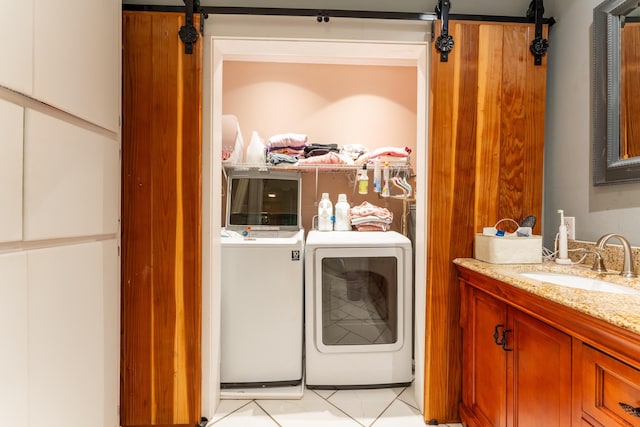 171 White St, Savannah, TN 38372 - laundry area with a sink, separate washer and dryer, laundry area, and a barn door