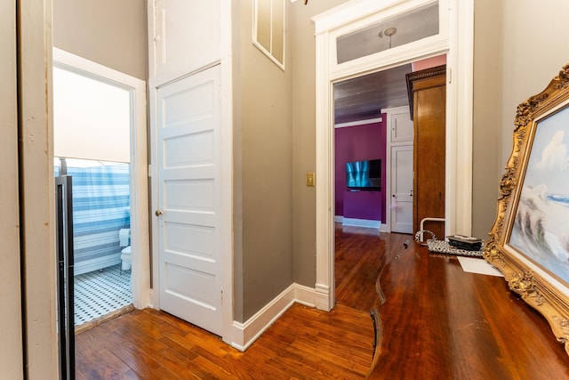 171 White St, Savannah, TN 38372 - corridor with baseboards and dark wood-type flooring