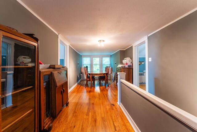 171 White St, Savannah, TN 38372 - dining space featuring ornamental molding and light wood-style flooring