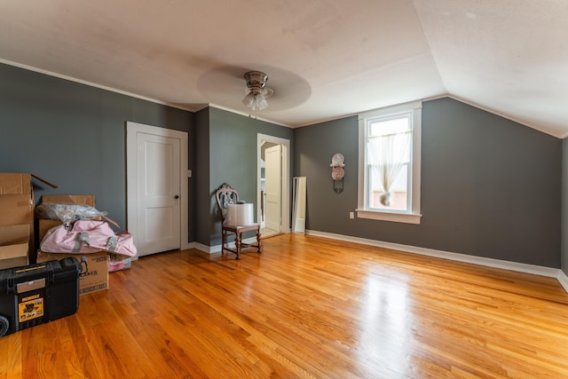 171 White St, Savannah, TN 38372 - bonus room with baseboards, ceiling fan, wood finished floors, and vaulted ceiling