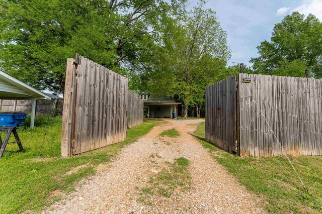 171 White St, Savannah, TN 38372 - view of street featuring gravel driveway