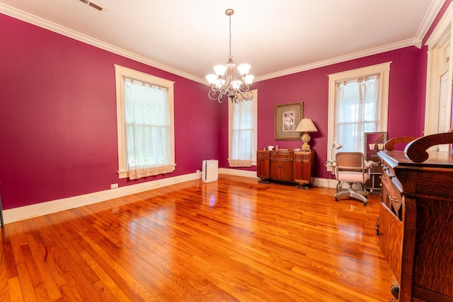171 White St, Savannah, TN 38372 - dining space featuring an inviting chandelier, plenty of natural light, and light wood-style flooring