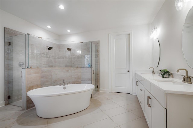 5082 Moudry Run Cv, Lakeland, TN 38002 - full bathroom with a sink, tile patterned flooring, a shower stall, and a freestanding bath