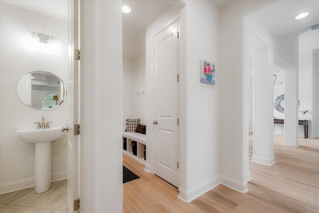 5082 Moudry Run Cv, Lakeland, TN 38002 - hallway with baseboards, light wood finished floors, and visible vents