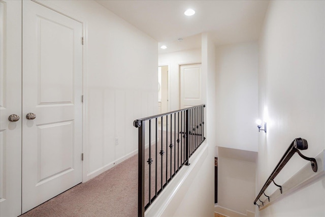 5082 Moudry Run Cv, Lakeland, TN 38002 - staircase with carpet floors, a wainscoted wall, and recessed lighting