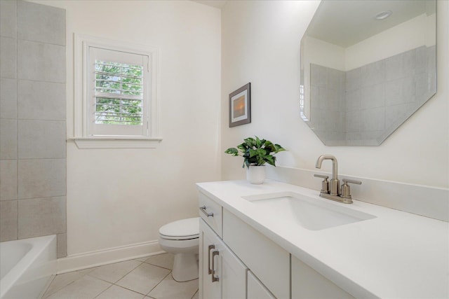 5082 Moudry Run Cv, Lakeland, TN 38002 - bathroom with vanity, baseboards, tile patterned floors, and toilet