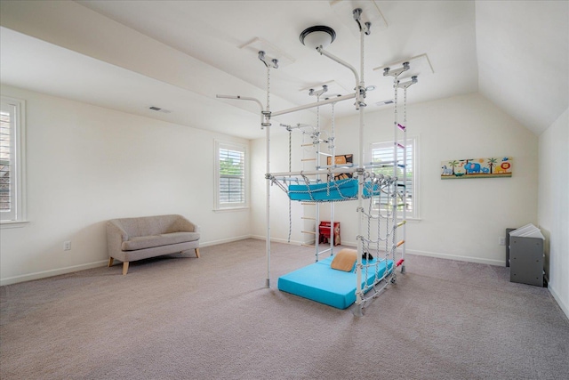 5082 Moudry Run Cv, Lakeland, TN 38002 - recreation room with baseboards, carpet, vaulted ceiling, and visible vents