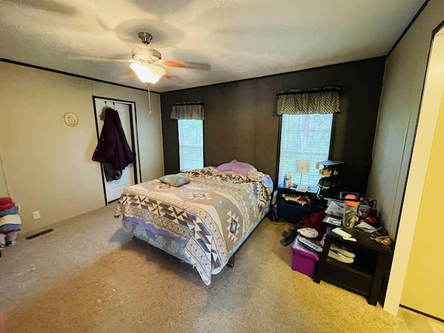 325 Geans Ln, Savannah, TN 38372 - bedroom with visible vents, carpet, and ceiling fan
