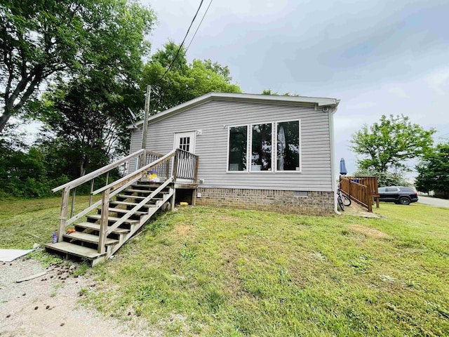 325 Geans Ln, Savannah, TN 38372 - exterior space with a front lawn and crawl space