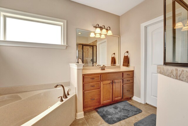 bathroom with vanity, tile patterned floors, a shower stall, and a bath