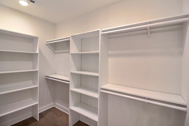 235 Freedom Ln, Rossville, TN 38066 - spacious closet with dark wood finished floors and visible vents