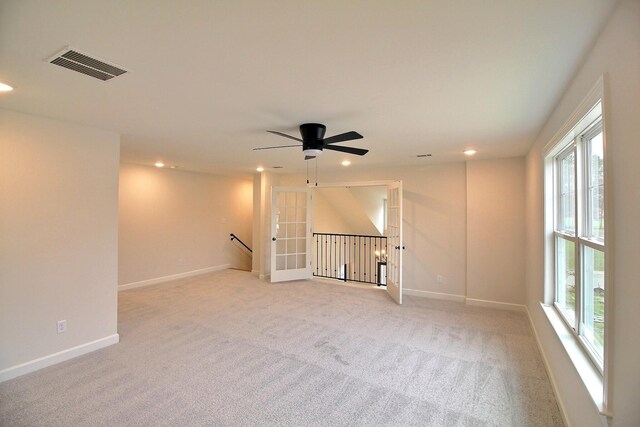 235 Freedom Ln, Rossville, TN 38066 - spare room featuring a ceiling fan, visible vents, baseboards, light carpet, and recessed lighting