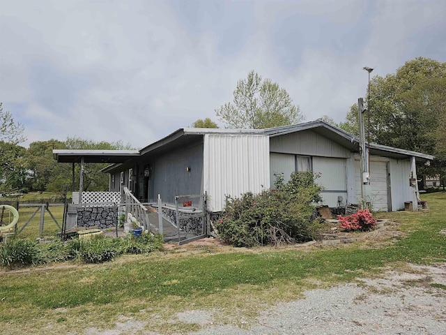 3845 Forked Deer Rd, Gates, TN 38037 - view of home's exterior featuring a lawn and covered porch