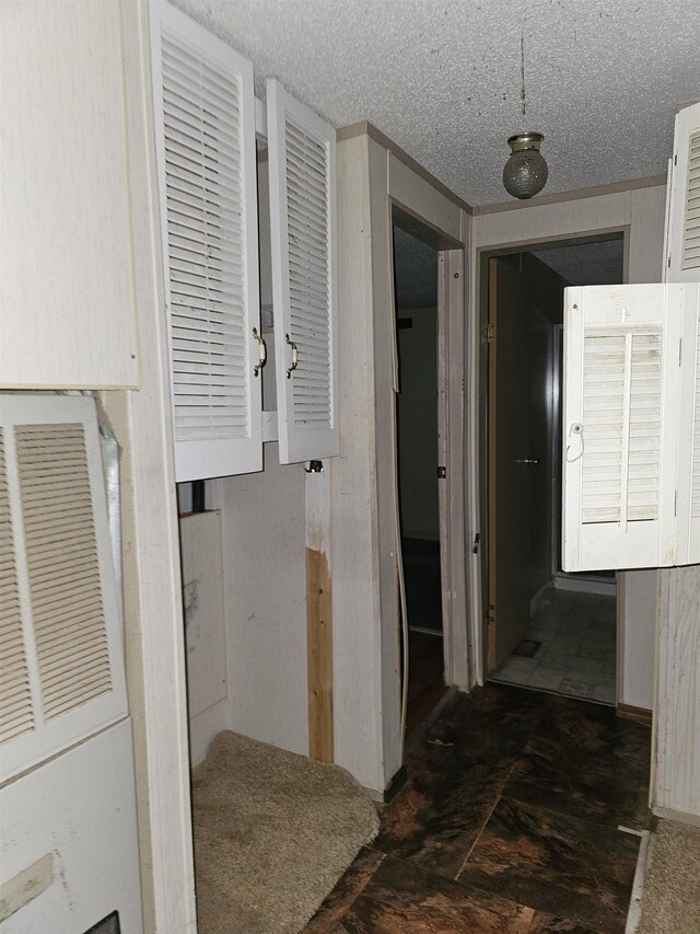3845 Forked Deer Rd, Gates, TN 38037 - hallway featuring a textured ceiling and a heating unit
