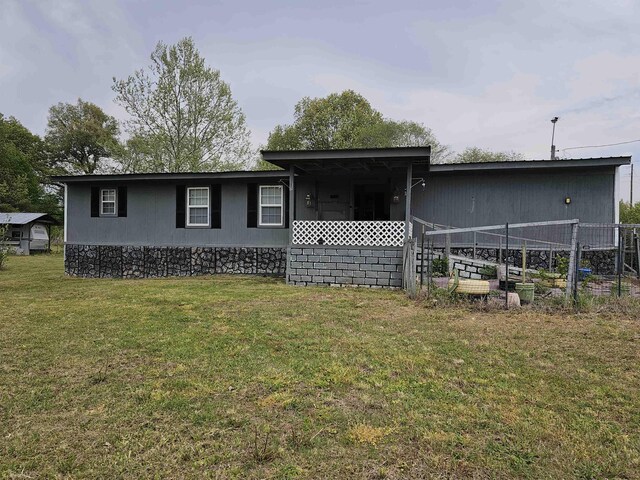 3845 Forked Deer Rd, Gates, TN 38037 - view of front of home with fence and a front yard